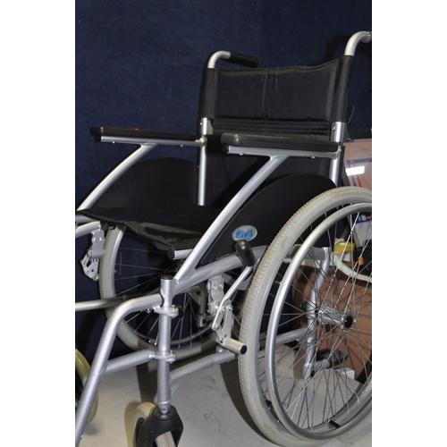 1063 - A DAYS MOBILITY FOLDING WHEELCHAIR  with footrests and a Days Travelator (2)