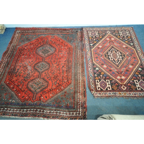 1309 - A TURKISH MILAS WOOLEN RUG, geometric design within a black field, 163cm x 115cm and a similar large... 