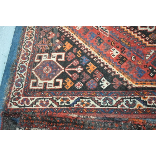 1309 - A TURKISH MILAS WOOLEN RUG, geometric design within a black field, 163cm x 115cm and a similar large... 