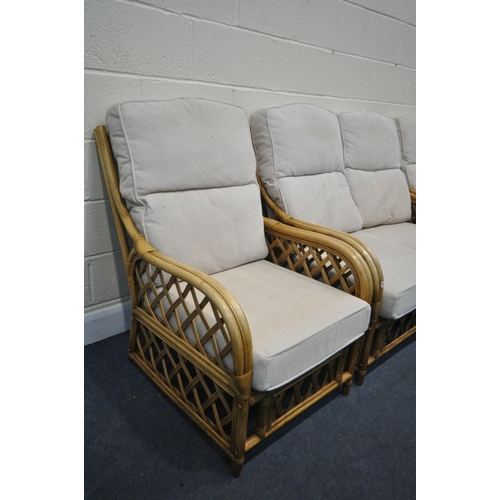 1310 - A WICKER THREE PIECE CONSERVATORY SUITE, comprising a two seater settee and a pair of armchairs (3)