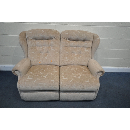 1313 - A PINK FLORAL UPHOLSTERED TWO SEATER SOFA, length 136cm (good condition)