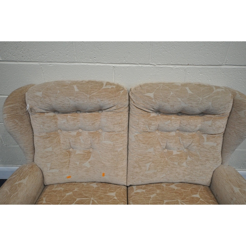 1313 - A PINK FLORAL UPHOLSTERED TWO SEATER SOFA, length 136cm (good condition)