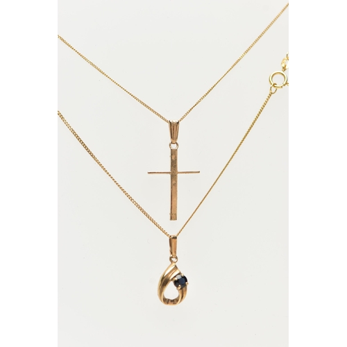 15 - TWO 9CT GOLD PENDANT NECKLACES, the first a polished cross pendant, hallmarked 9ct Birmingham, fitte... 