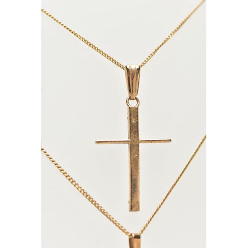 15 - TWO 9CT GOLD PENDANT NECKLACES, the first a polished cross pendant, hallmarked 9ct Birmingham, fitte... 