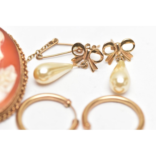 16 - A 9CT GOLD CAMEO BROOCH AND THREE PAIRS OF EARRINGS, an oval carved shell cameo depicting a lady in ... 