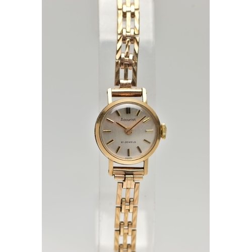 A LADIES 9CT GOLD 'ACCURIST' WRISTWATCH, manual wind, round silver dial ...