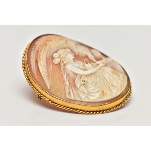 22 - A YELLOW METAL CAMEO BROOCH, of an oval form, carved shell cameo depicting Hebe and Zeus in eagle fo... 