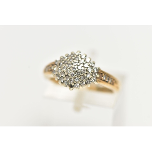 27 - A 9CT GOLD DIAMOND CLUSTER RING, of a marquise form set with single cut diamonds, single cut diamond... 