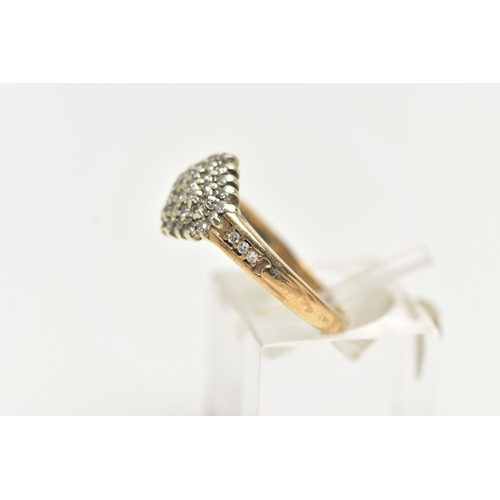 27 - A 9CT GOLD DIAMOND CLUSTER RING, of a marquise form set with single cut diamonds, single cut diamond... 