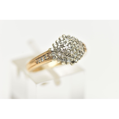 27 - A 9CT GOLD DIAMOND CLUSTER RING, of a marquise form set with single cut diamonds, single cut diamond... 