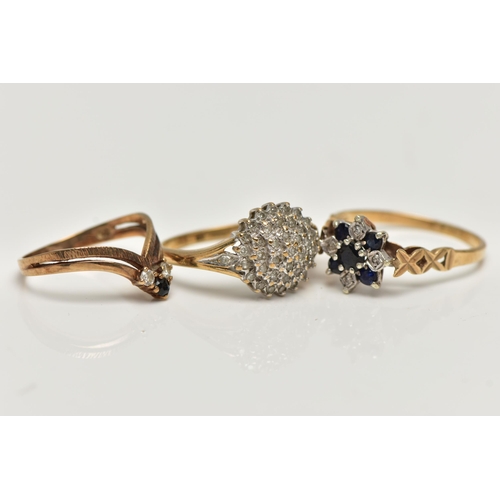 28 - THREE 9CT GOLD DIAMOND AND GEM SET RINGS, to include a single cut diamond tiered cluster ring, estim... 