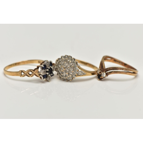 28 - THREE 9CT GOLD DIAMOND AND GEM SET RINGS, to include a single cut diamond tiered cluster ring, estim... 