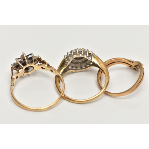 28 - THREE 9CT GOLD DIAMOND AND GEM SET RINGS, to include a single cut diamond tiered cluster ring, estim... 