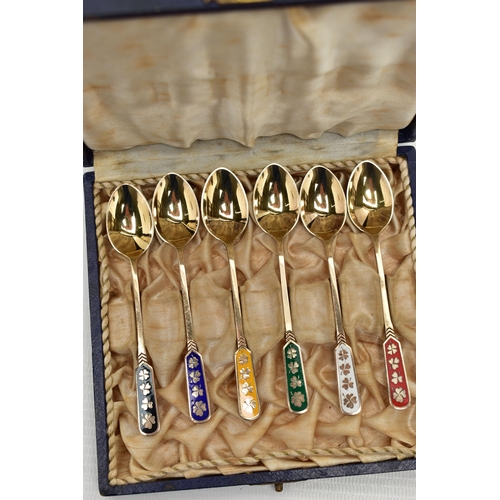 39 - A CASED SET OF SIX SILVER GILT AND ENAMEL HARLEQUIN COFFEE SPOONS, marked 'Ela DENMARK STERLING 925S... 