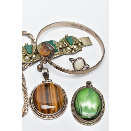 64 - A COLLECTION OF SILVER AND WHITE METAL GEM SET JEWELLERY, to include a tiger's eye bangle, Swedish h... 