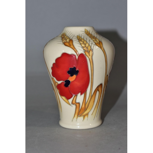 331 - A MOORCROFT 'POPPY HARVEST' BUD VASE, designed by Emma Bossons, tube lined wheat and red poppies on ... 