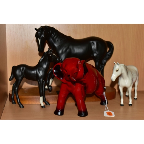 341 - A ROYAL DOULTON FLAMBÉ ELEPHANT FIGURE TOGETHER WITH TWO BESWICK HORSE FIGURES, the elephant height ... 