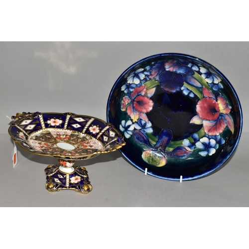 364 - A ROYAL CROWN DERBY IMARI PATTERN DISH TOGETHER WITH A MOORCROFT BOWL, comprising a two handled pede... 