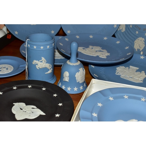 384 - A COLLECTION OF USA THEMED WEDGWOOD JASPER WARES, mainly pale blue, to include a boxed 'Eagle and St... 