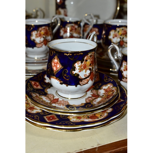 393 - A TWENTY THREE PIECE ROYAL ALBERT 'HEIRLOOM' PATTERN TEA SET, comprising six cups (two have small un... 