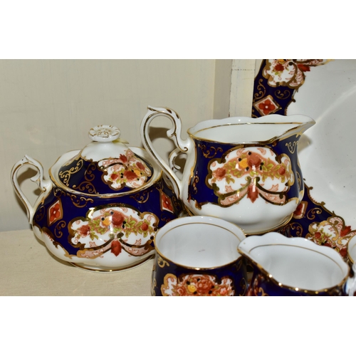 393 - A TWENTY THREE PIECE ROYAL ALBERT 'HEIRLOOM' PATTERN TEA SET, comprising six cups (two have small un... 