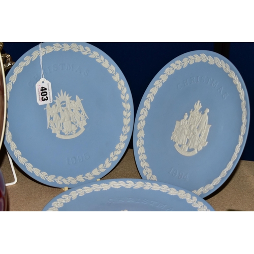 403 - FIVE WEDGWOOD BLUE JASPER WARE CHRISTMAS CABINET PLATES, comprising 1992, 1994,1995, two 1996 plates... 