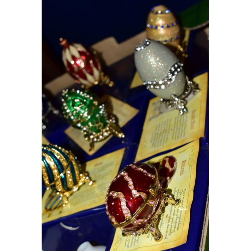 406 - A COLLECTION OF MINIATURE BRASS ITEMS TOGETHER WITH EIGHT BOXED ATLAS DECORATIVE EGGS, comprising a ... 