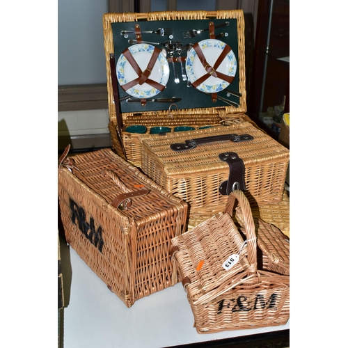 513 - SIX WICKER BASKETS, comprising a small Fortnum and Masons hamper together with a small handled F&M b... 