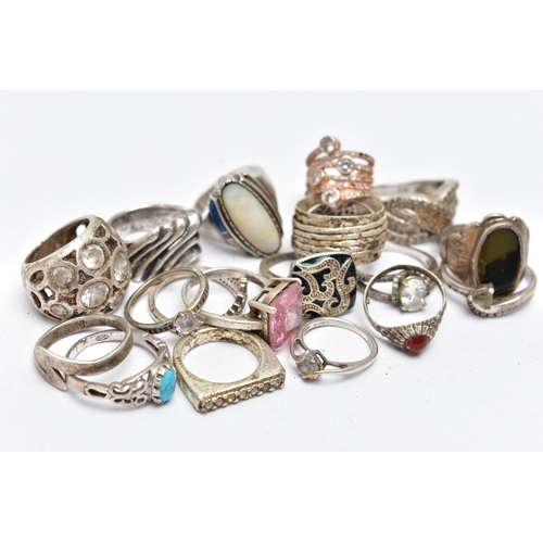 100 - AN ASSORTMENT OF SILVER AND WHITE METAL RINGS, to include a silver ring set with a heart cut cubic z... 