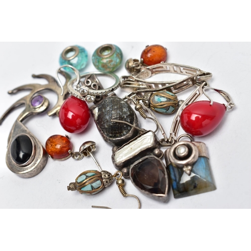 102 - AN ASSORTMENT OF WHITE METAL JEWELLERY, to include four pendants, two charms, three pairs of earring... 