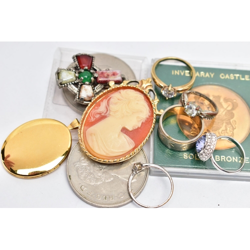 106 - A BAG OF ASSORTED ITEMS, to include a silver gilt oval locket, decorated with a floral pattern to th... 