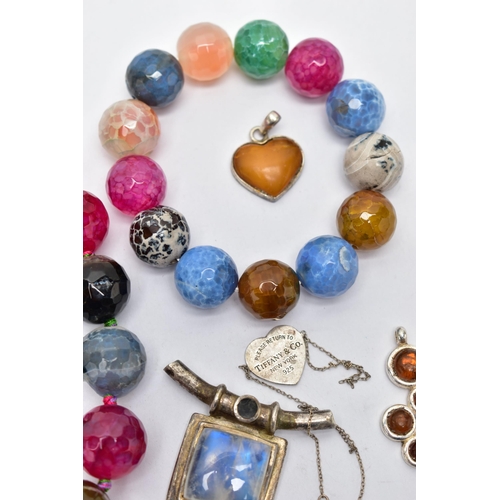 109 - A BAG OF ASSORTED JEWELLERY, to include a quartz cabochon pendant, collet set in a white metal mount... 