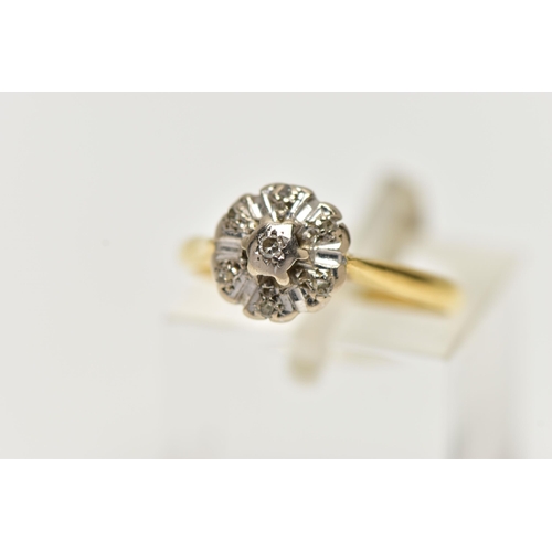 72 - A DIAMOND CLUSTER RING, set with a principal single cut diamond, within an old cut diamond surround,... 