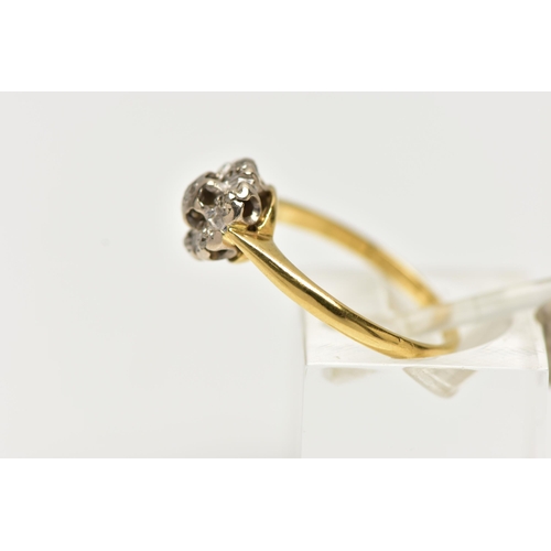 72 - A DIAMOND CLUSTER RING, set with a principal single cut diamond, within an old cut diamond surround,... 