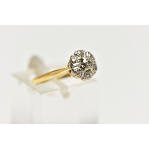 72 - A DIAMOND CLUSTER RING, set with a principal single cut diamond, within an old cut diamond surround,... 