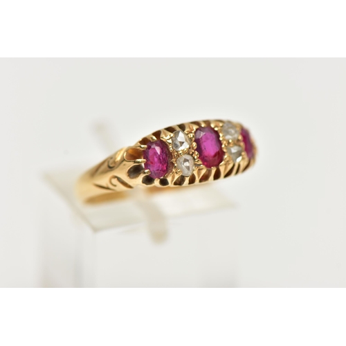 88 - AN EARLY 20TH CENTURY 18CT GOLD RUBY AND DIAMOND RING, three oval cut rubies set with four rose cut ... 