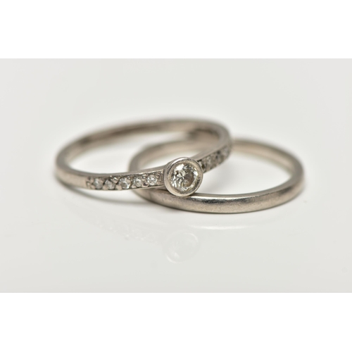 95 - A PLATINUM WEDDING SET, the first a round brilliant cut diamond bezel set, approximate total diamond... 