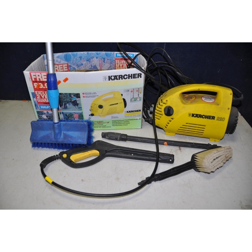 1073 - A KARCHER 220 PRESSURE WASHER with lance and extendable brush (PAT pass and working)