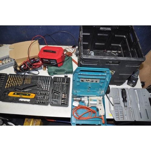 1075 - A COLLECTION OF CASED TOOLS to include cased screwdriver set, cased drill bit set, pair of stillsons... 