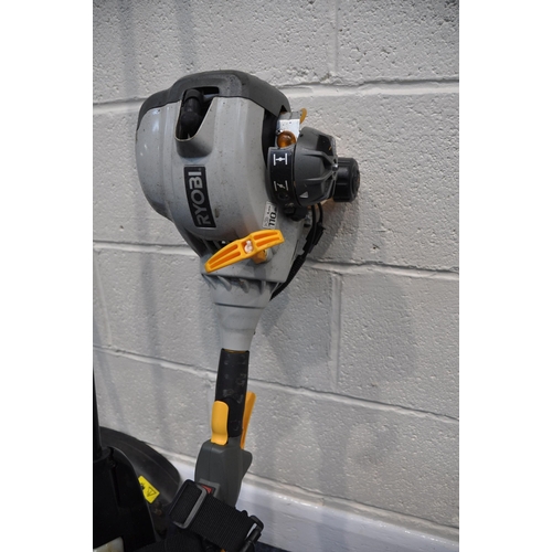 1080 - A RYOBI RBC30SES BUSH CUTTER along with an extendable chainsaw attachment (UNTESTED but engine pulli... 