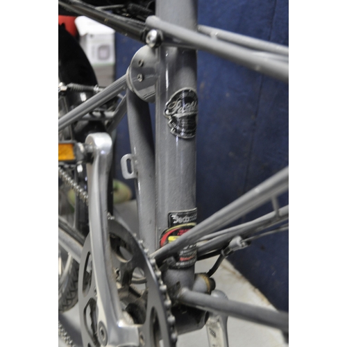 1099 - AN ALEX MOULTON SPACE FRAME BICYCLE badged Alex Moulton to front stem, R425 at rear of stem, also ba... 