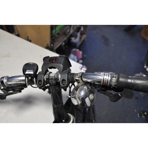 1099 - AN ALEX MOULTON SPACE FRAME BICYCLE badged Alex Moulton to front stem, R425 at rear of stem, also ba... 