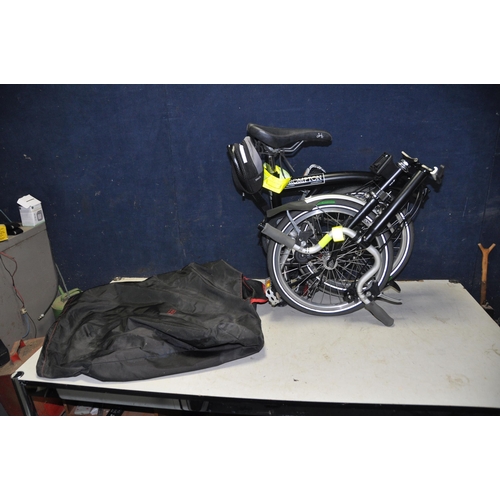 1101 - A BROMPTON FOLDING BIKE WITH BAG in black