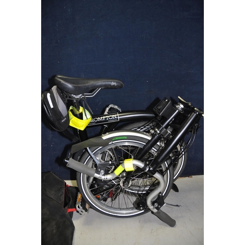 1101 - A BROMPTON FOLDING BIKE WITH BAG in black