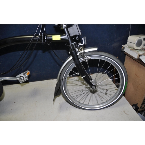 1101 - A BROMPTON FOLDING BIKE WITH BAG in black