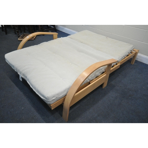 1375 - A MODERN BEECH FOLDING FUTON, length 141cm