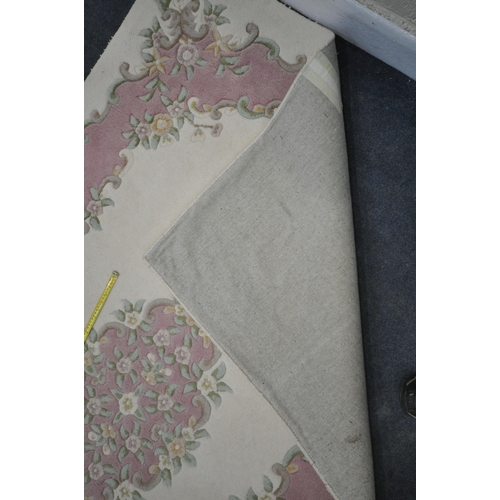 1386 - A LATE 20TH CENTURY CREAM AND PINK CHINESE RUG, 237cm x 148cm