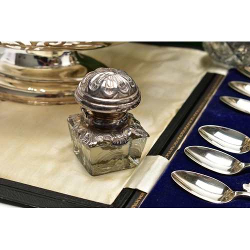 103 - A BOX OF ASSORTED WHITE METAL, to include a white metal ink stand, floral design with two glass pots... 