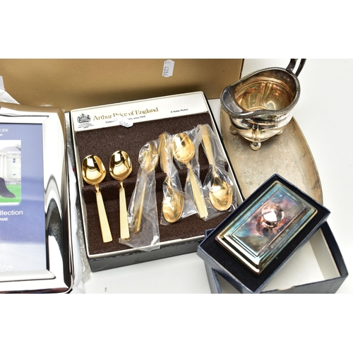 106 - A BOX OF ASSORTED WHITE METAL WARE, to include a boxed 'Arthur Price', silver plated photo frame, a ... 