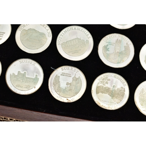 112 - A BIRMINGHAM MINT LARGE CASED DISPLAY OF FOURTY STERLING SILVER MEDALS EACH MEDAL WEIGHT 40gr EACH (... 